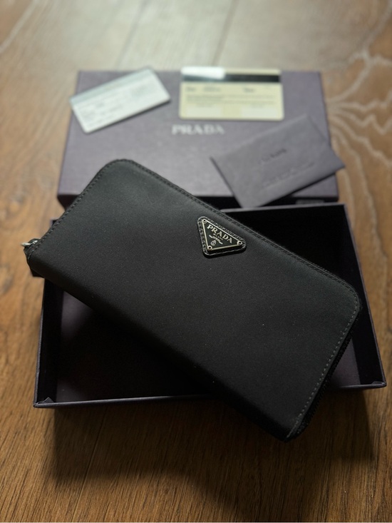 Prada Handbags - PRADA Zip Around Tessuto Nylon Wallet in black with silver triangle hardware